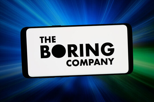 Stuttgart, Germany - 03-09-2026: In this photo illustration, the logo of tunnel building business The Boring Company is displayed on a smartphone in front of abstract background on computer screen.