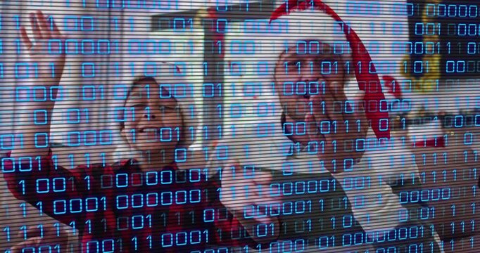 Animation of data processing over caucasian father and son at christmas