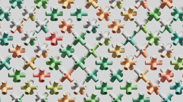 This video shows colorful cross shaped parts moving in a grid. It is a playful 3D animation with a lot of energy. 3D render animation.
