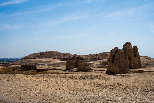 Ancient mudbrick ruins in desert landscape near Qurna
