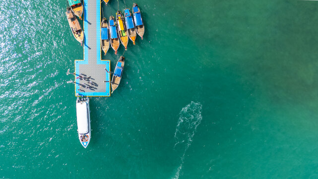 Traditional wooden longtail boats East Railay Beach Krabi southern Thailand