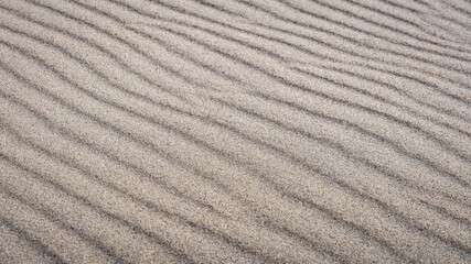 Fototapeta premium A wave-like untouched sand structure formed by wind