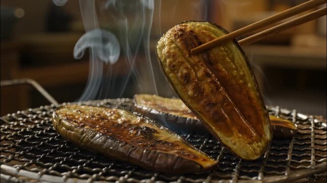 Close Up Cooking Shot of Miso Glaze Brushed on Grilled Eggplant Slices on Kitchen Grill, Caramelizing Japanese Miso Dengaku with Steam Rising 4k video footage