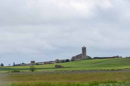 Santa Maria Arbis Church in Baquerin de Campos seen from surrounding farmlands
