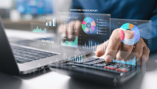 Businessman use laptop and calculator to finance management on financial analytics dashboard to accounting data analysis, growth chart report, portfolio performance and investment metrics.