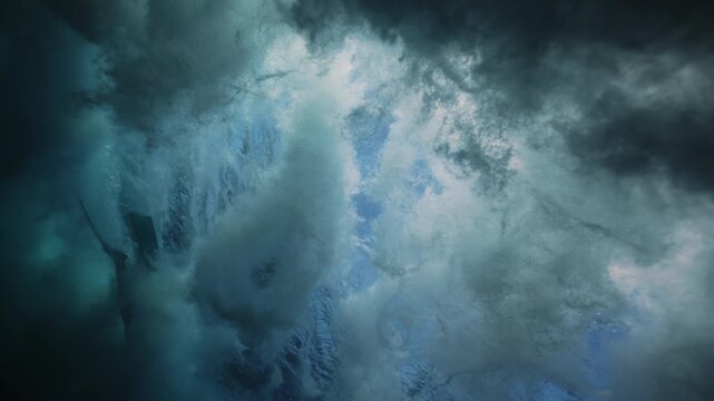 Powerful strong wave breaks underwater turbulence, wave crashing on the corral reef in tropical ocean. spinning vortex. powerful nature, strong wave, danger of drowning. seascape slow motion.