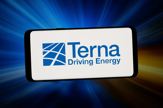 Stuttgart, Germany - 03-09-2026: In this photo illustration, the logo of Italien power network company Terna S.p.A. is displayed on a smartphone in front of abstract background on computer screen.