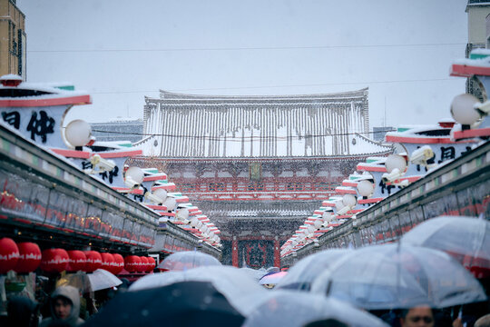 A snowy day. Asakusa. Senso-ji Temple and worshippers.