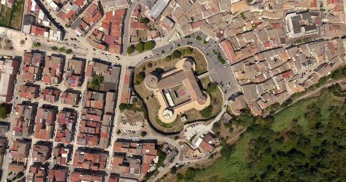 Aerial zenith view of the historic center of Venosa, a town in province of Potenza, Basilicata, Italy. At the center is the Aragonese Castle, a historic fortified building and attraction of the city.
