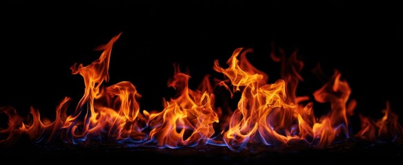 The Flames Dancing Across a Dark Background with Blue and Orange Fire