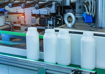 conveyor line for the production of plastic bottles close-up