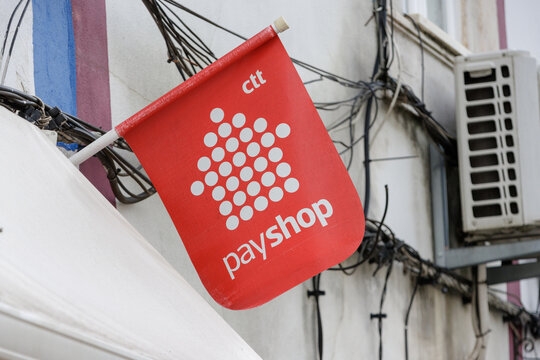 CTT Payshop red flag on urban building wall