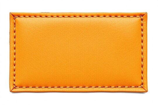 Blank rectangular orange leather patch with visible stitching on all sides, studio shot with bright lighting and isolated white background
