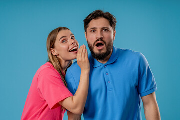 Naklejka premium Gossiper Woman Whispers In boyfriends Ear Secret, Rumors, Gossips, Blue Studio