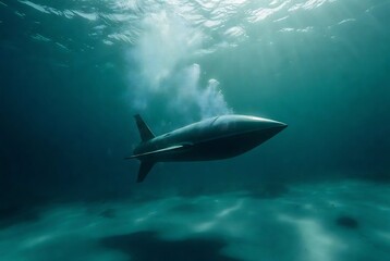 Fototapeta premium A submarine is gliding through a deep, blue ocean.