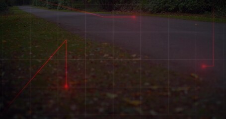Showing paved road curving left at dusk, with red laser-like markers and translucent grid overlay