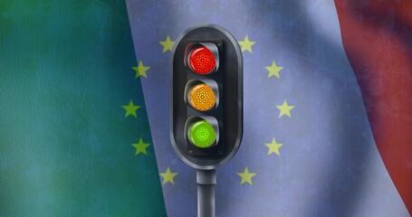 Naklejka premium Displaying traffic light on short pole before draped flags with yellow stars, with tricolor lenses