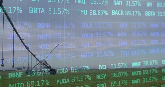 Stretching center-pivot irrigation system moving across rural field to horizon, with cyan overlay