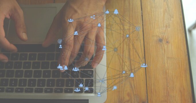 Typing hands with bare arms on laptop keyboard, trackpad on wooden table at home, social overlay