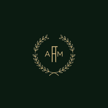 Elegant Monogram Logo with Laurel Wreath.