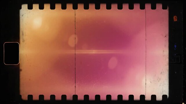 Video of vintage color burn with warm gradient light leak transition, retro film overlay effect, nostalgic cinematic background for creative editing projects.