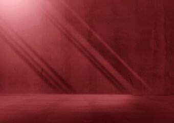 Moody Deep Red Empty Room Studio Backdrop with Dramatic Diagonal Light Streaks and Shadows on Concrete Wall and Floor for Cinematic Product Placement Showcase and Professional Photography Space.