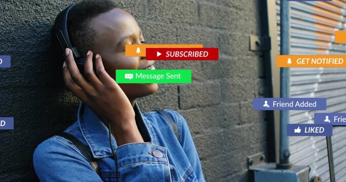 Woman leaning on block wall adjusting headset while social badges floating from right notifying her