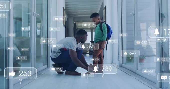 Backpack signaling leave, father kneeling tying son's shoes while icons multiplying and high-fiving