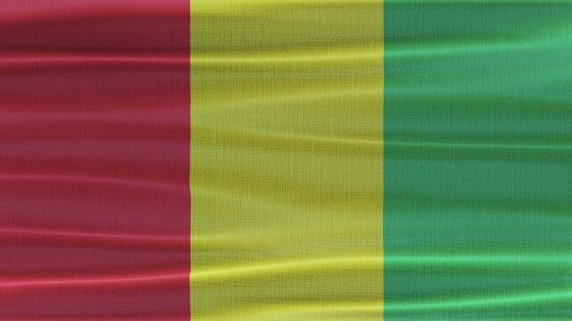Guinea flag waving in the wind with high quality fabric texture