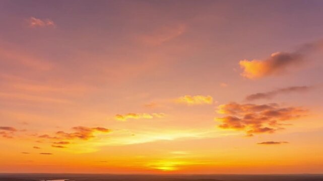 Vibrant sunset with dynamic clouds casting long shadows over the horizon