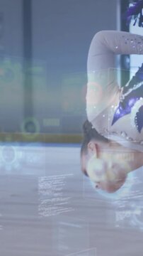 Vertical video: Upright turn starting gymnast arching back and extending legs, practicing skill