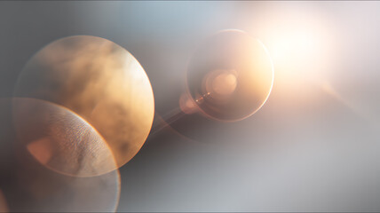 Naklejka premium Glowing orange and yellow orbs with bright light on right side in space