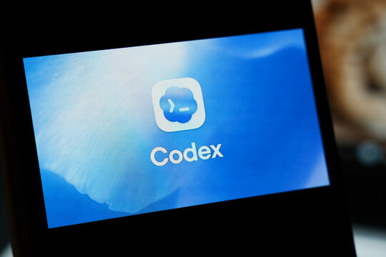 Warsaw, Poland - March 12, 2026: Close-up of the Codex application logo displayed on a mobile device screen. The blue background enhances the digital theme.