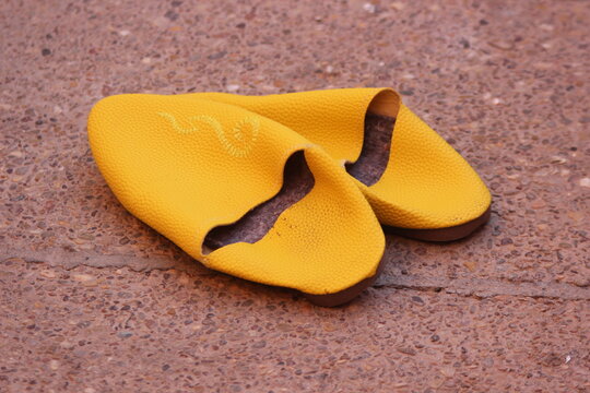 Yellow traditional Moroccan slippers known as babouche