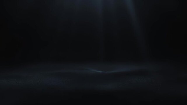 Dim blue shafts of light pierce a black void, fading into soft haze above a barely rippling surface; a minimal, cinematic atmosphere suggests depth, silence, and restrained tension.