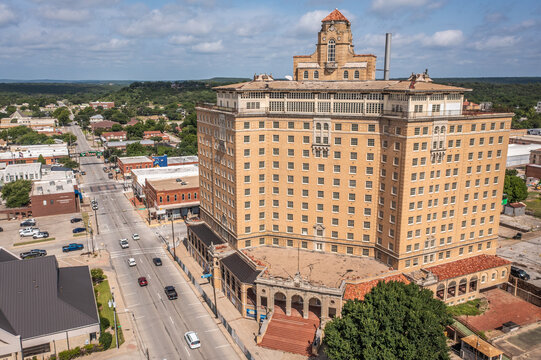 Aerial Drone View of the Baker Hotel and Surrounding Buildings and Roads in Mineral Wells, Texas