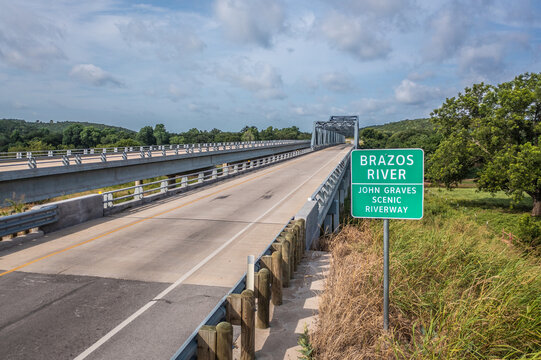 Brazos River Sign Near Empty Bridge With Road Over River in Mineral Wells, Texas