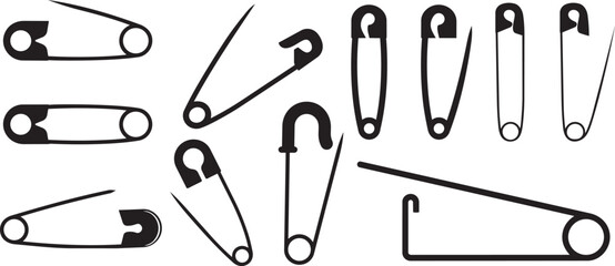 Set of metal safety pins and office sewing tools isolated on white background