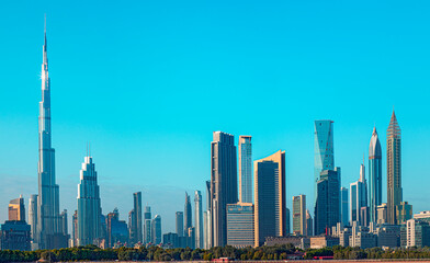 Panoramic skyline of Dubai with modern skyscrapers and futuristic architecture at sunset. Iconic cityscape of the largest city in the United Arab Emirates, famous for luxury tourism, business district © Rastislav Sedlak SK