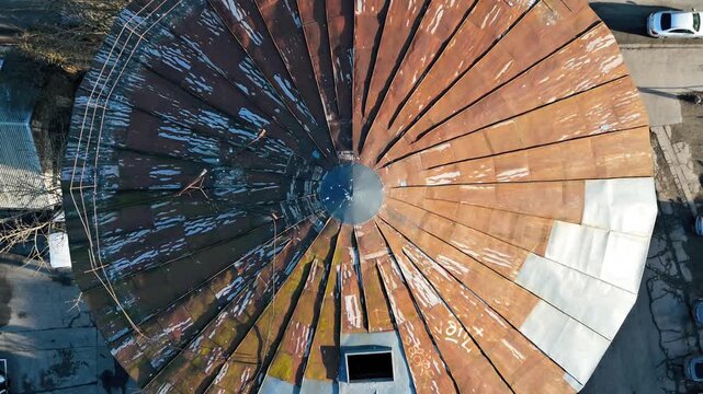 Aerial Top-Down View of Circular Industrial Roof in Telliskivi Creative Quarter, Tallinn, Estonia