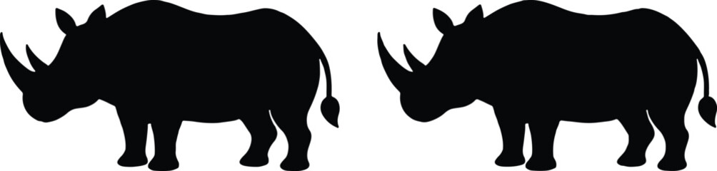 Two black rhinoceros silhouettes side-by-side on a white background, showcasing powerful wildlife and conservation imagery. © MdBijoyAli