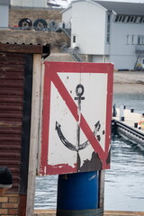 Fototapeta premium No anchoring sign on the pier of the research station at Ny Alesund, Svalbard, Norway