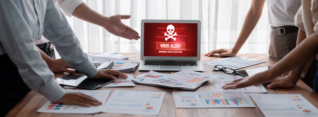 Virus warning alert on computer screen detected brisk cyber threat , hacker, computer virus and...