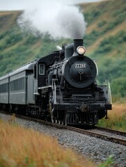 Fototapeta premium Vintage steam locomotive traveling through scenic countryside
