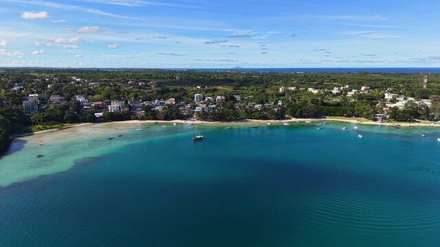 Scenic aerial drone video of the Trou d`Eau Douce resort, Mauritius, Africa. Indian ocean coral reef landscape	