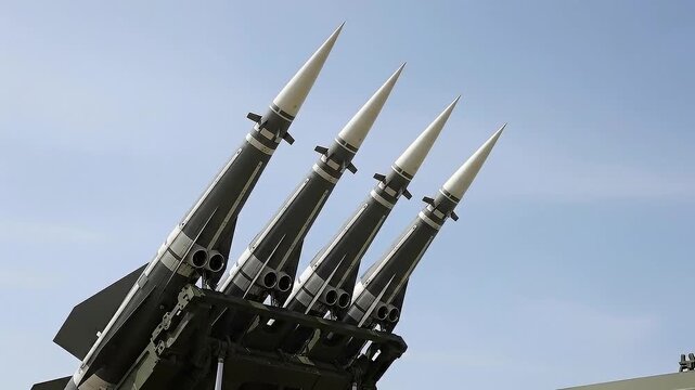 Close-up of multiple missiles on a launch system aimed at the sky, Military missile launch system with several missiles ready for launch,Advanced missile launch system