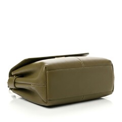 Naklejka premium Elegant tan leather laptop sleeve with secure closure for portability and protection