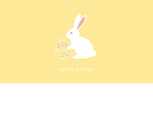 Fototapeta premium White Easter bunny with a basket of eggs.