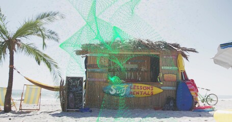 Naklejka premium Displaying bamboo tiki surf rental hut on sandy beach, showing LESSONS RENTALS sign, surfboards