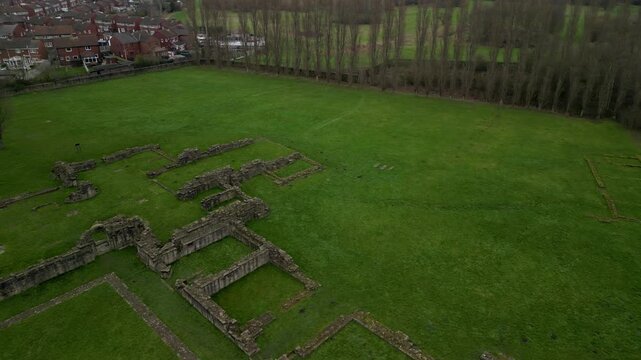 Ancient Monastic Site of Monk Bretton Priory, Stationary Aerial Shot of Religious Ruins, West Yorkshire Borders, 4K